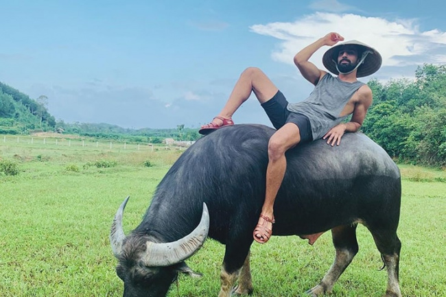 riding a water buffalo in hoi an - unique activity for village experience