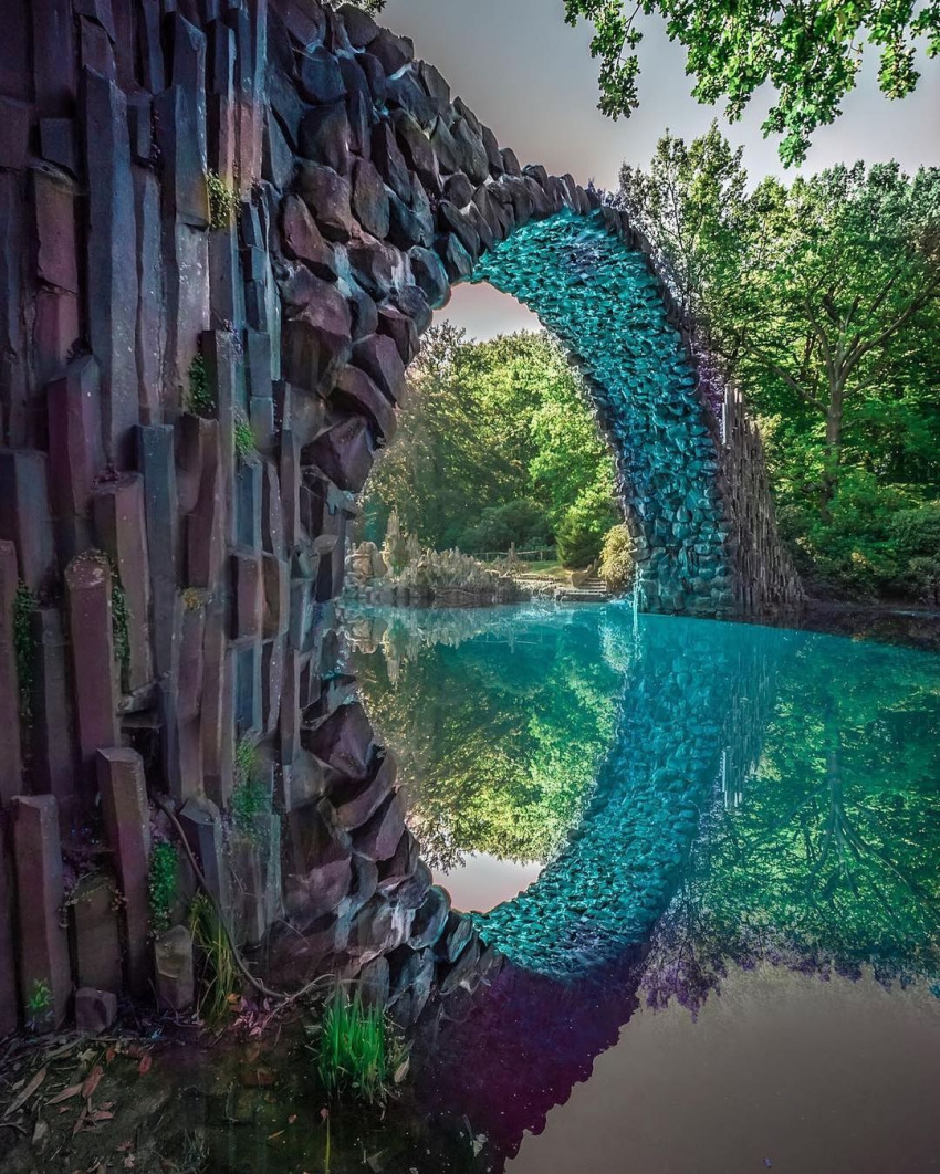 Rakotzbrücke, a real-life fairy-tale half-circle bridge in the forest in Germany