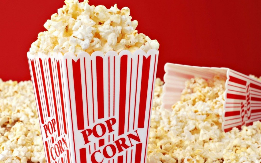 Why do movie theaters choose to sell popcorn and not something else?