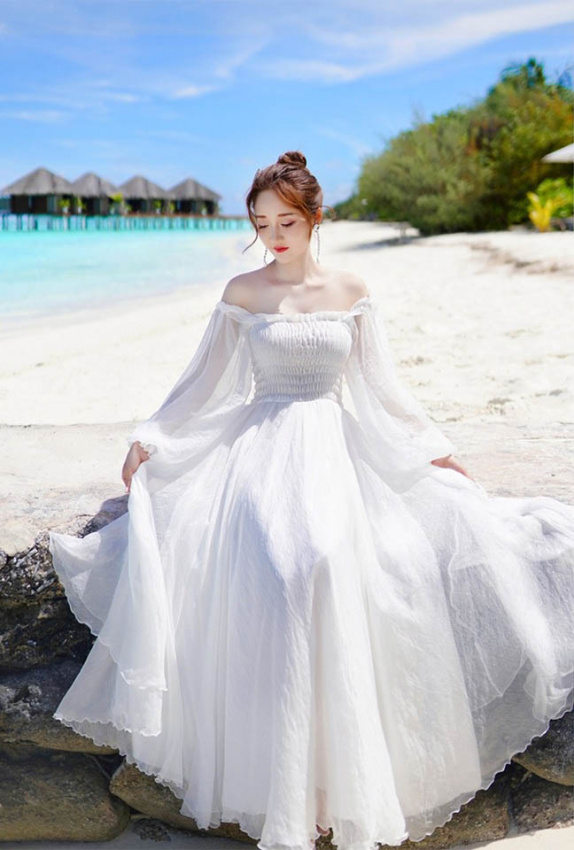 Bảng kiểm tra 20 mẫu váy đi biển “mặc vào là đẹp” - Mytour