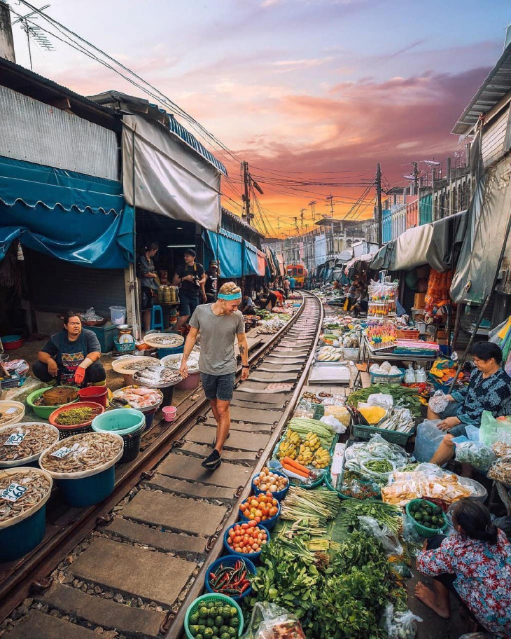 en, maeklong railway market - the most unique train market in bangkok