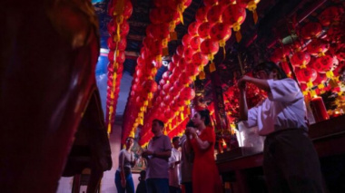 Hundreds of bright red lanterns inside the famous Soc Trang pagoda